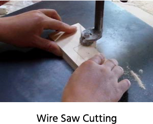 wire saw cutting wooden toys