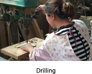 drilling holes on wooden toys